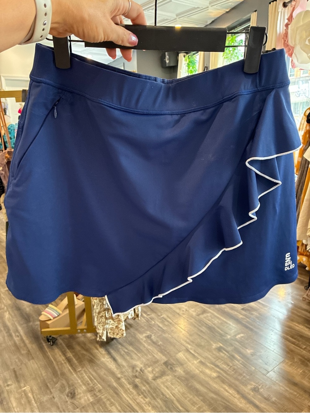 Unbridled Women’s Navy Ruffle Athletic Skort with Zip Pocket